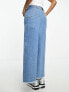 ASOS Weekend Collective low rise denim midi skirt in mid wash