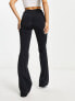 Фото #2 товара ASOS DESIGN stretch lace up front flare trouser in black