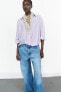 Фото #1 товара Рубашка в полоску с блестящей нитью и узлом ZARA