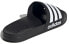 Фото #5 товара Шлепанцы Adidas Adilette Shower Slides унисекс черного цвета