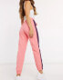 Champion logo track pants in pink