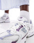 New Balance 530 trainers in white and purple