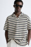 Striped textured polo shirt