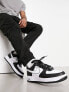 Фото #1 товара Nike Air Force 1 '07 trainers in black and white