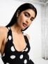 ASOS DESIGN scoop twist back midi dress in black and white spot