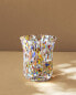 Blown glass tumbler with speckled design