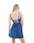 Фото #1 товара Calvin Klein Jeans cut out denim mini dress in mid wash