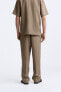 Belted 100% linen trousers