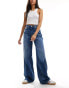 Фото #1 товара Tommy Jeans Claire high rise wide jeans in mid wash