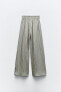 Creased-effect satin trousers
