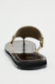 Leather flat sandals with rings