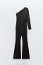 Flared polyamide asymmetric jumpsuit