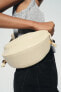 OVAL CROSSBODY BAG