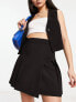 ASOS DESIGN pleated mini skirt in black 34 - фото #13