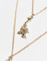 ASOS DESIGN 2 pack necklace set with faux shell and pendant in gold tone