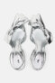 Metallic kitten heel shoes with bow