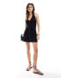 Фото #1 товара ASOS DESIGN halter mini dress with button front in black