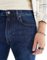 Levi's 502 tapered fit jeans in mid blue