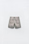 Trf mid-rise denim bermuda shorts