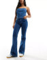 Фото #1 товара Tommy Jeans Sylvia high waisted flared jeans in mid wash