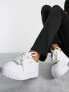 Puma Cali Dream trainers in white and green