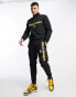 Polo Ralph Lauren sports capsule leg logo cuffed joggers in black CO-ORD