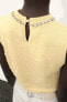 Knit top with rhinestones and faux pearls