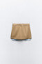 Mini skirt with drop pockets
