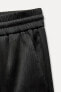 CREASED-EFFECT WIDE-LEG TROUSERS