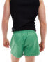 Фото #3 товара ASOS DESIGN swim short in short length in green with hem detail