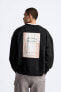 Crew neck sweatshirt with patch