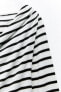 Delicate striped asymmetric top with overlay detail