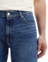 Фото #5 товара Tommy Jeans regular tapered dad jeans in mid wash