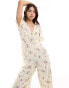 Фото #2 товара ASOS DESIGN spun flutter sleeve wide leg jumpsuit in floral print