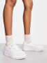 Puma Cali Dream trainers in white and leopard print - exclusive to ASOS