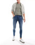 ASOS DESIGN spray on jeans with power-stretch in mid wash blue VERWASCHENES DUNKELBLAU, W31 L32 - фото #15