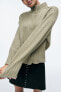 High neck knit sweater