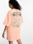 ASOS DESIGN oversized t-shirt with festival graphic in pink