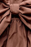 Cut-out taffeta dress with bow