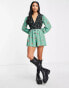 ASOS DESIGN Petite bubble crepe plunge neck playsuit with puff sleeve in mixed print