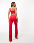 Flounce London cut out flared jumpsuit in red