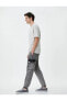Фото #1 товара Джинсы Koton Oversize Jogger с карманами и завязками
