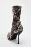 ANIMAL PRINT HEELED ANKLE BOOTS