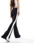 Фото #2 товара ASOS DESIGN contrast seam kick flare trouser in black