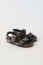 Buckled leather sandals