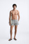 Check-texture swimming trunks