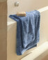 Cotton bordered bath towel