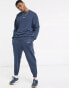 Фото #1 товара ASOS DESIGN co-ord oversized joggers in washed navy with text print