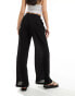 Bershka crinkle wide leg trousers in black