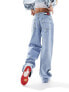 Фото #7 товара Tommy Jeans Daisy low rise baggy jeans in light wash